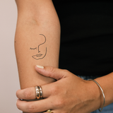 Abstracte Knipoog Tatoeage