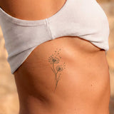 Fijne paardenbloem tatoeage
