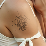 Zon en lotus Tatoeage
