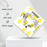 Hartvormige bloemenkrans met vlinder en vis Tatoeage