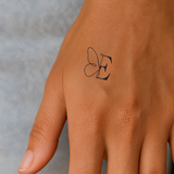 Vlinder met initialen tatoeage (A-Z)