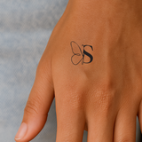 Vlinder met initialen tatoeage (A-Z)