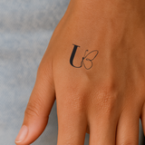 Vlinder met initialen tatoeage (A-Z)