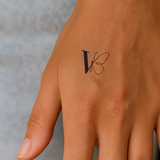 Vlinder met initialen tatoeage (A-Z)