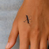 Vlinder met initialen tatoeage (A-Z)