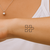 Puzzelstukje met initialen tatoeage (A-Z)