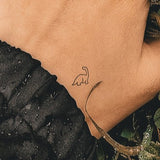 Kleine Brontosaurus Tatoeage