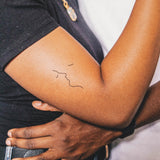 Kussende Gezichten Tatoeage