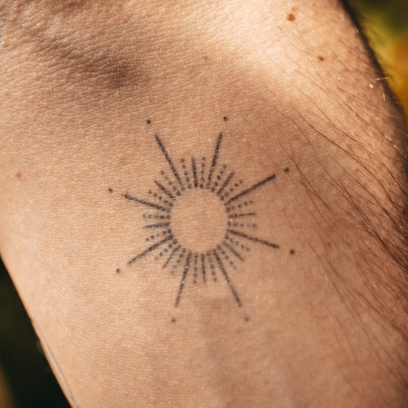 Sun Ornament Tattoo 