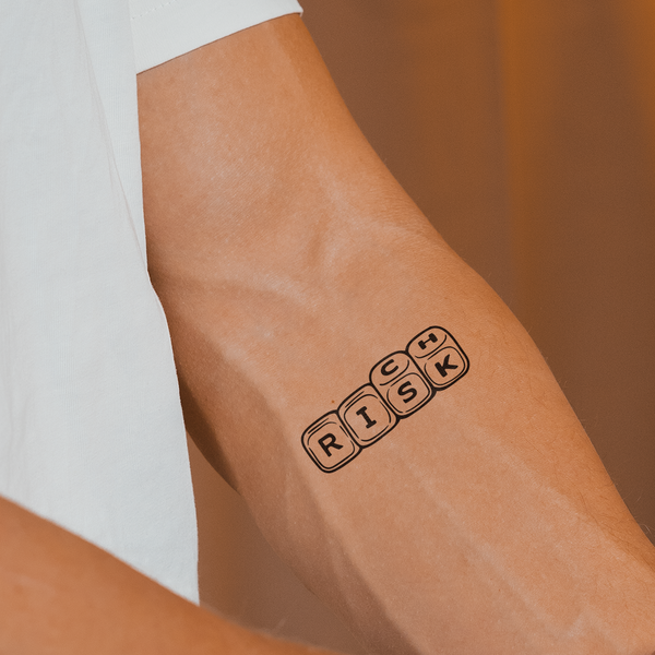 Rich/ Risk Tatoeage