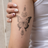 Butterfly with Symbols Tattoo