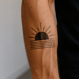 geometrische zonsopgang Tatoeage