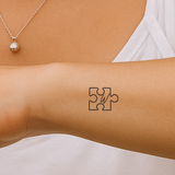 Puzzelstukje met initialen tatoeage (A-Z)