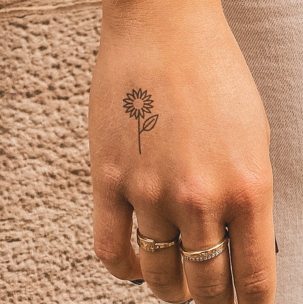 Small Sunflower Tattoo On Wrist